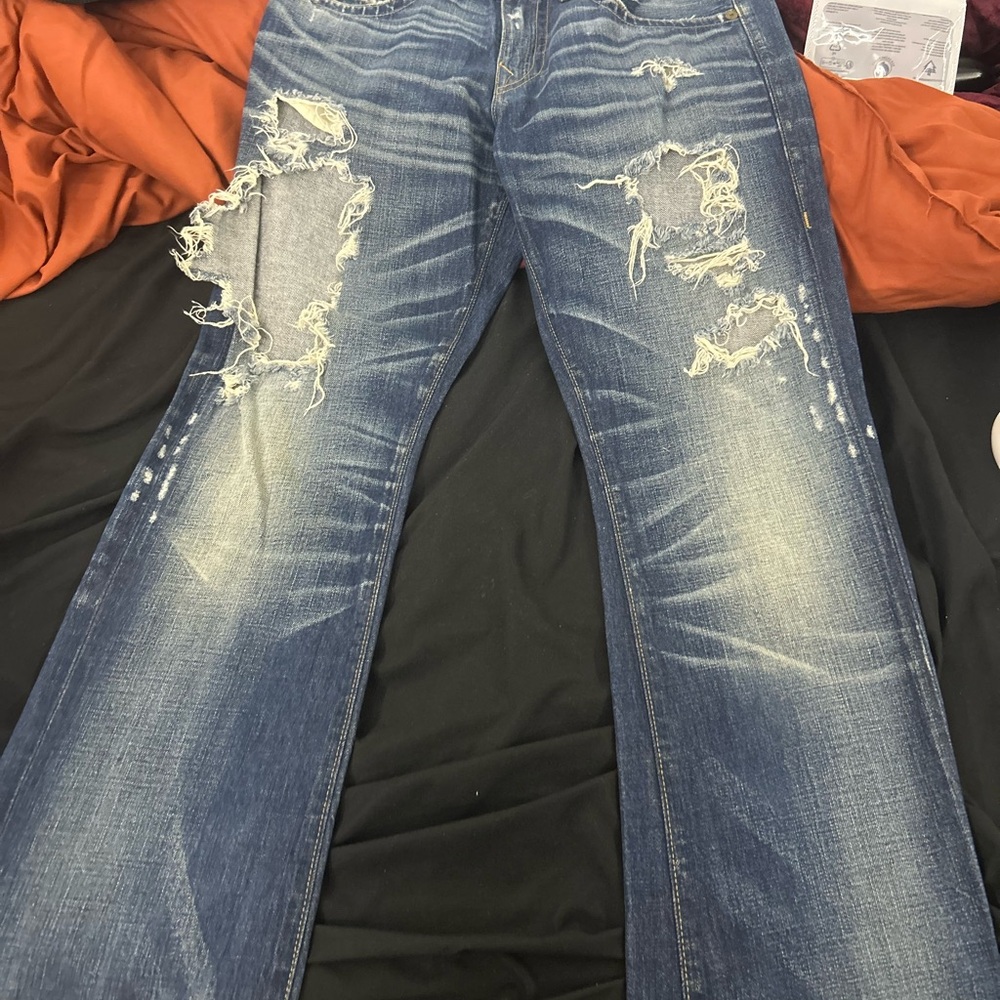 Distressed True Religion Jeans